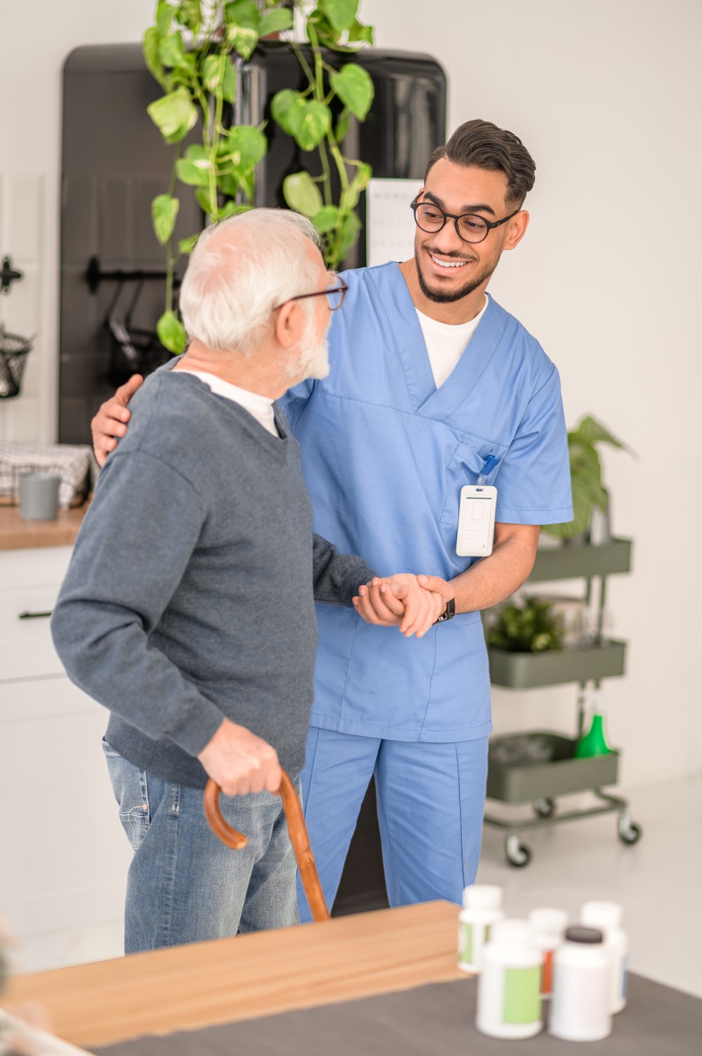 Caregiver providing compassionate in-home care for an elderly resident in West Hartford, Connecticut
