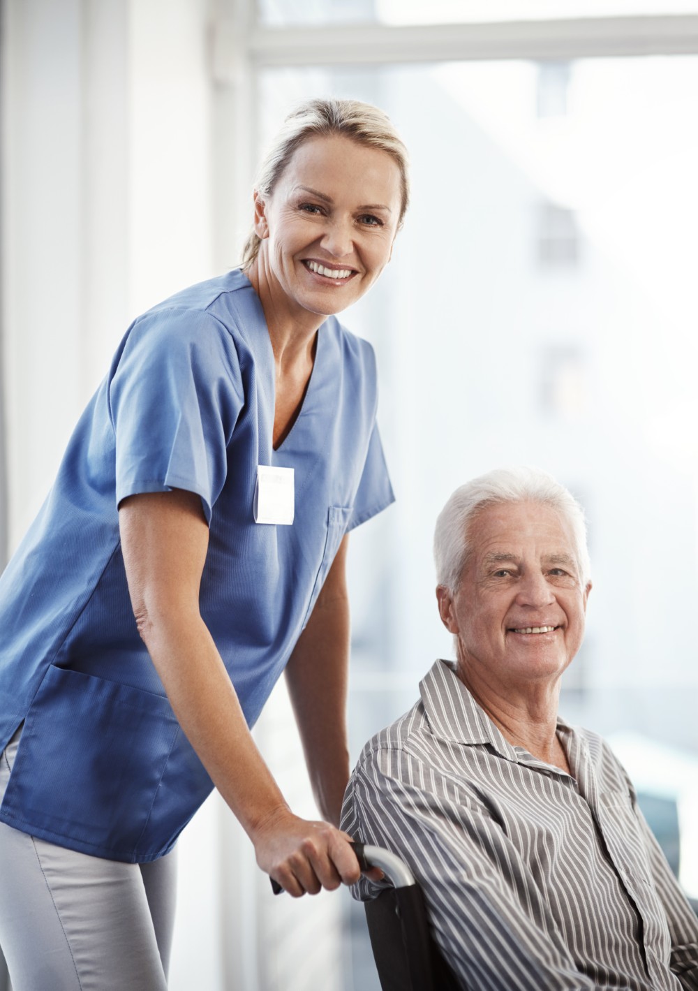 Caregiver providing compassionate in-home care for an elderly resident in Waterbury, Connecticut
