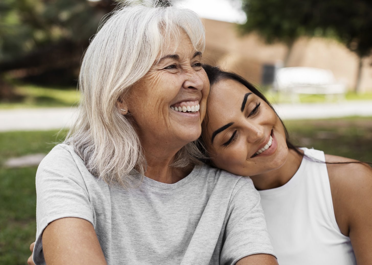 Two Greys Home Care caregivers outside, representing the team culture and caregiver career opportunities in Connecticut
